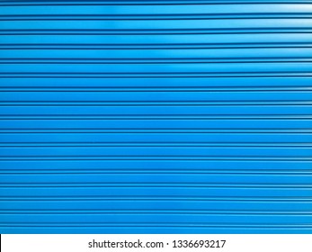 Blue Rolling Steel Door Texture Pattern Background.