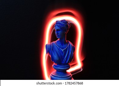 Blue Roman Greek Statue With Light Painting In Red