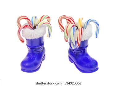 Blue Santa Claus Boots, Saint Nicholas, With Colored Candies Bars, Isolated On White Background.