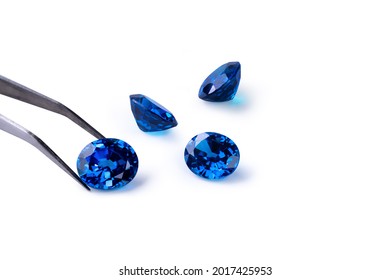 Blue sapphire gemstone isolated on white background