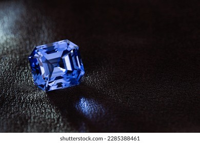Blue Sapphire Gemstone on Dark Background