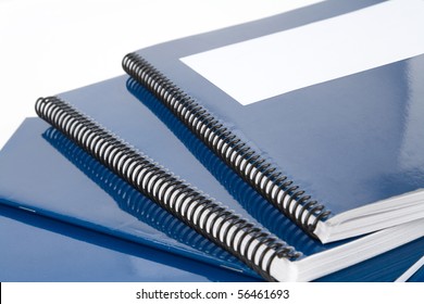 Blue school textbook, notebook or manual with white background