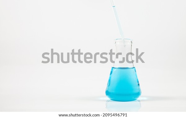 blue\
science test tube on white\
background,Laboratory,