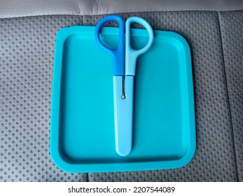 Blue Scissors With Handy Safety Cap.