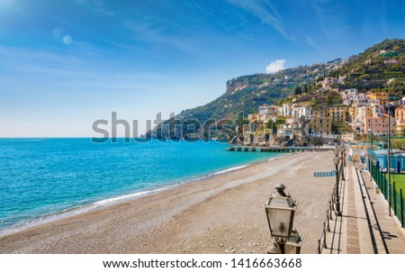 Blue sea and beach in Minori, attractive seaside town at centre of Amalfi Coast, province of Salerno, in Campania region of south-western Italy. 