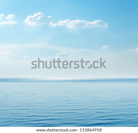 Blue sea and clouds on sky. Ukrainian Black Sea view, Crimea.