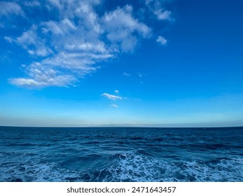 Blue sea and cloudy sky over it. Tropical sea - Powered by Shutterstock