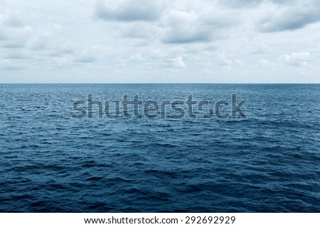 blue sea and cloudy sky waves in Atlantic Ocean