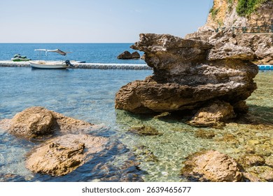 Blue sea and rocky coastline. Coastal nature and clear water landscape. - Powered by Shutterstock - Get 15% off with code: PIKWIZARD15