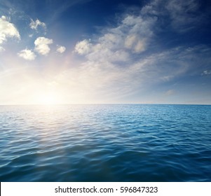 Blue Sea And Sun On Sky