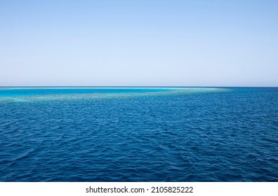 Blue Sea Water Horizon Line. Sea Water Background. Blue Sea With Little Waves Texture. Sea Water Surface Texture