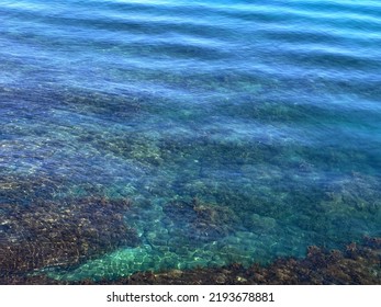 Blue Sea Water With Ripples Aerial View.