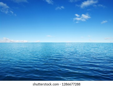 Blue Sea Water Surface On Sky