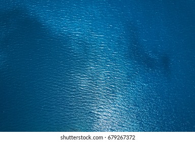 Blue sea water texture aerial drone view. Blue lagoon water surface - Powered by Shutterstock