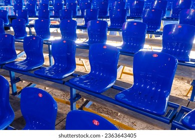 Blue seats on the podium as a background. - Shutterstock ID 2363643405