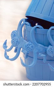 Blue Set Of Barrel Of Monkeys On A White Plane