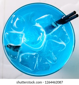 Blue Shark Cocktail Closeup On Bar Counter With Copy Space Top Down