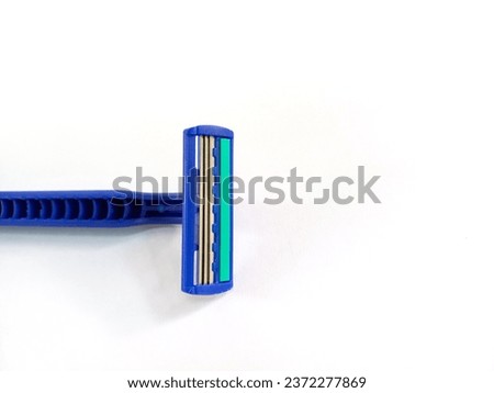 Blue shaver on isolated background