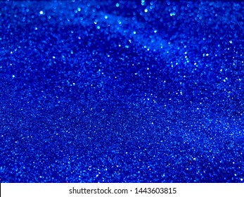 blue shining glitter texture background. Selective focus.Shallow dof. - Shutterstock ID 1443603815