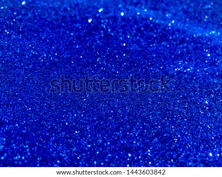 blue shining glitter texture background. Selective focus.Shallow dof.