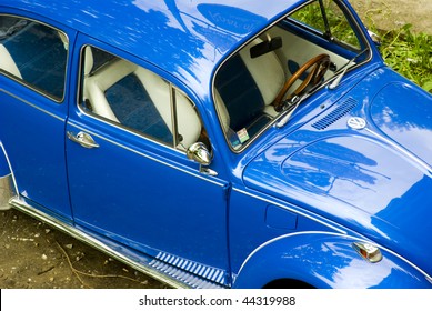 Blue And Shiny Vintage Beetle Car