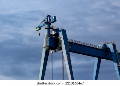 Blue Shipyard Crane In Harbor 