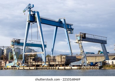 Blue Shipyard Crane In Harbor 