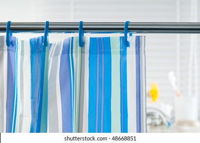 Blue Shower Curtain In The Bathroom