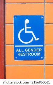 Blue Sign With All Gender Restroom Note And PWD Symbol At San Francisco, California