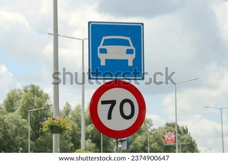 Blue sign motorway and speed limit 70 kilometers  in the Netherlands