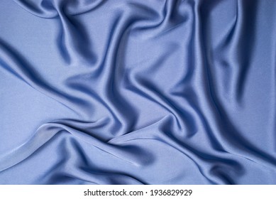 Blue Silk Or Satin Luxury Fabric Texture. Top View.