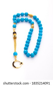 Blue Silver Islamic Rosary On White Background