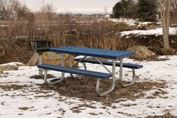 Blue And Silver Table In The Winter. Snow On The Ground.