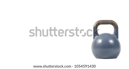 Blue single heavy kettlebell weight isolated on the white background, sport and workout concept