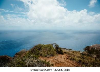 Blue Skies And Clouds And Pacific Ocean View From Mountain Peak On Tropical Hawaiian Island