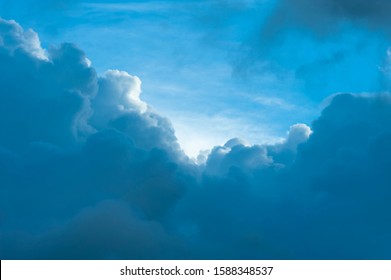 Blue sky with amazing white clouds close-up. Horizontal shot.