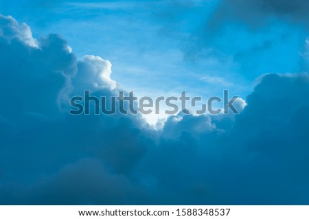 Blue sky with amazing white clouds close-up. Horizontal shot.