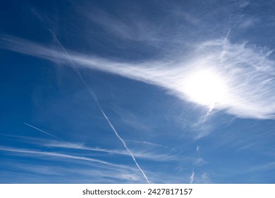 Blue sky Background with aircraft contrails - Powered by Shutterstock