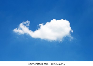 Blue Sky Background With Cloud In The Shape Of A Whale. Copy Space