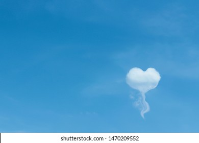 Blue Sky Background And Single White Clouds In Heart Shaped Balloon Patterns Concept Floating , Copy Space