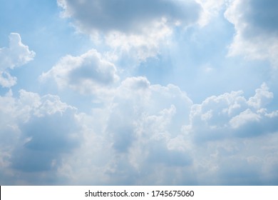 blue sky background with tiny clouds