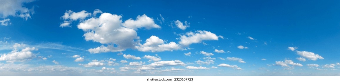 Blue Sky background with tiny Clouds. Panorama background