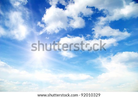 Blue sky background with a tiny clouds