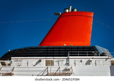 The Blue Sky Behind The Smoke Stack Of A Cruise Ship Docked At Yokohama, Japan.