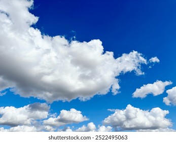 Blue sky with billowy clouds