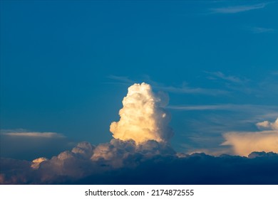 Blue Sky With Characteristic Gray And White Clouds. Clouds That Paint Strange Unusual Shapes.