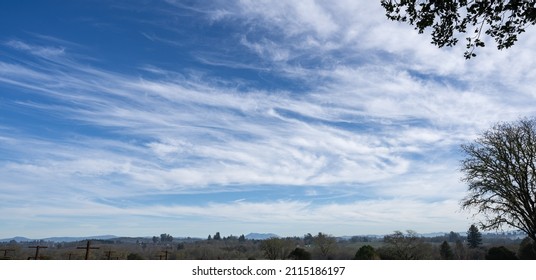 Blue Sky And Cirrus Clouds Over Sonoma County, California. Mount Saint Helena Is Visible On The Horizon.