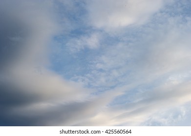 Blue sky with cloud. The clouds were scattered across the sky and followed the constant wind blowing.