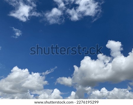 Blue sky and Cloud Cumulonimbus a large group of white filled the sky beautiful at  Bangkok, Thailand.no focus
