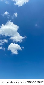 Blue Sky And Cloud Natural Background, Big White Fluffy Clouds In The Blue Sky And Blue Sky With Cloud Close Up.